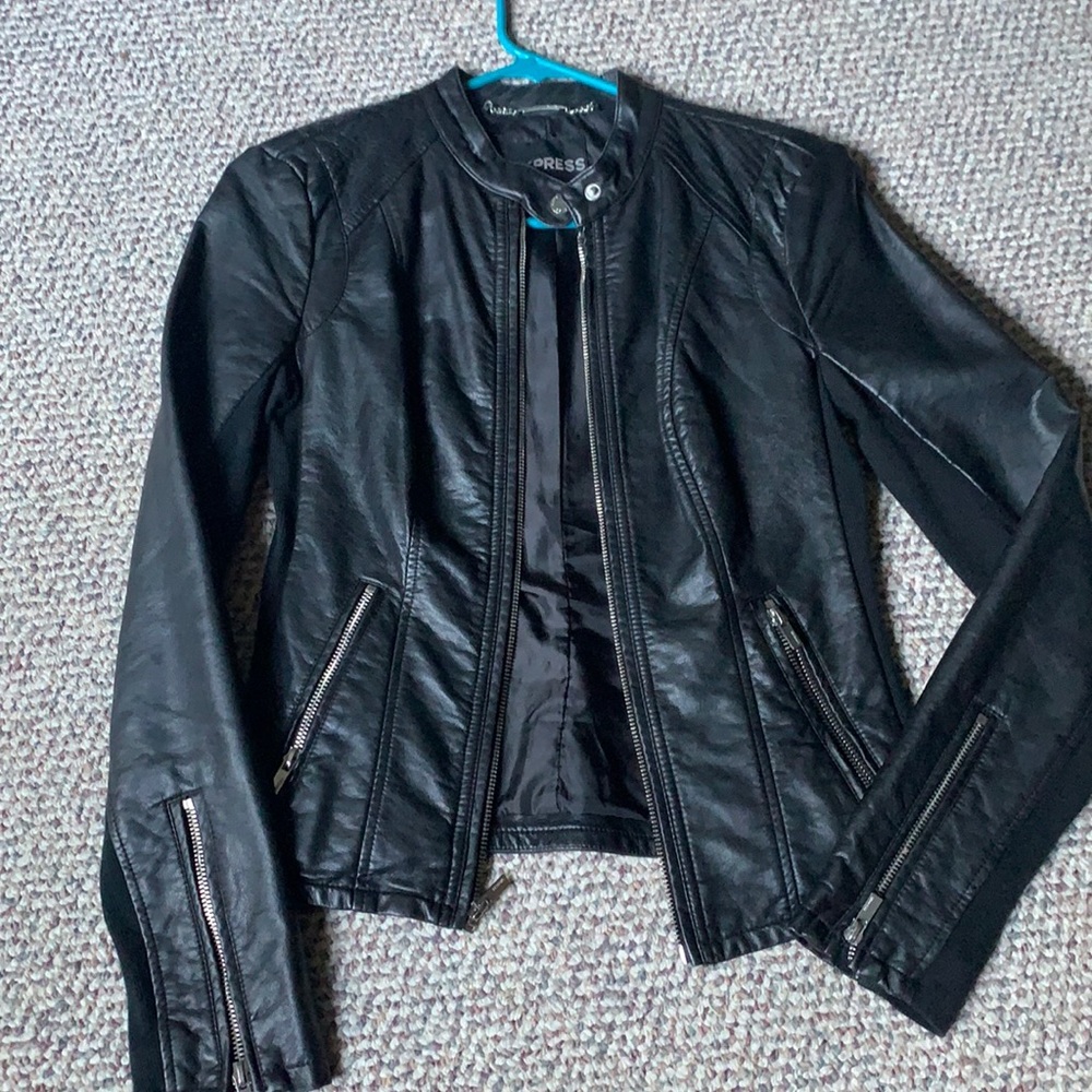 Black leather jacket with silver zippers